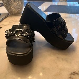 Very cute new slide on black patent leather with heart detail sandals